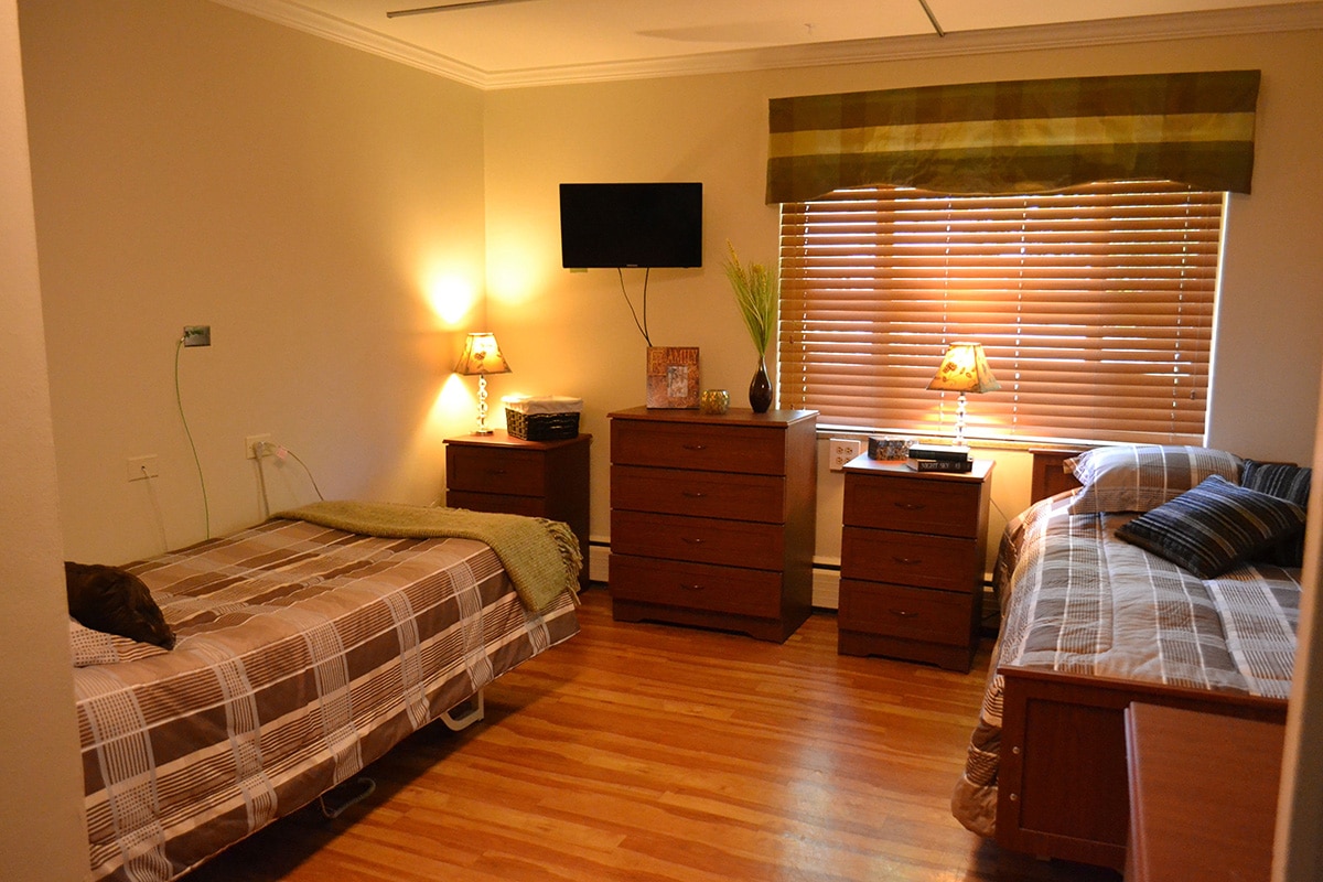 semi-private bedroom at the Amberwood facility