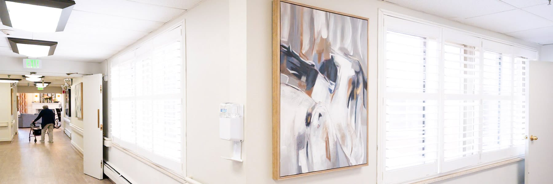 Hallway with painting hung at Amberwood Post Acute